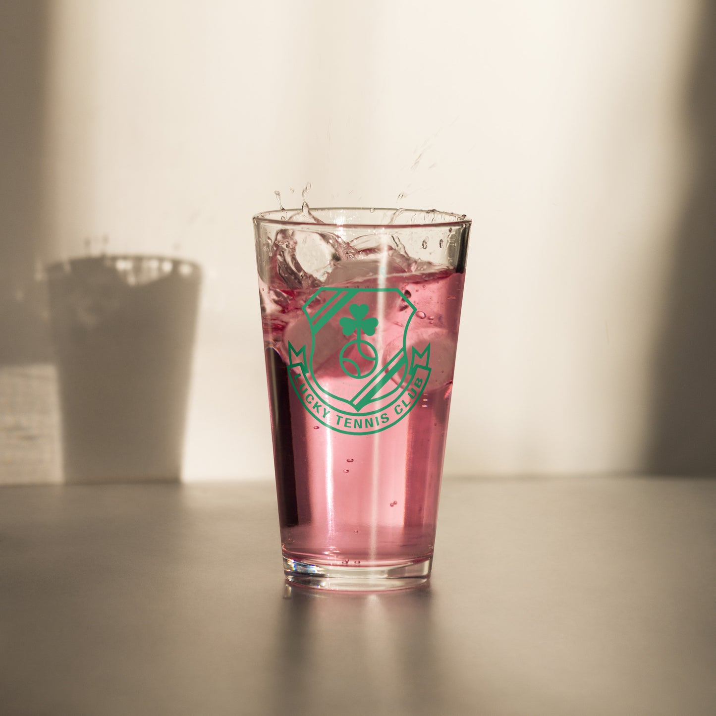 Lucky Tennis Club pint glass